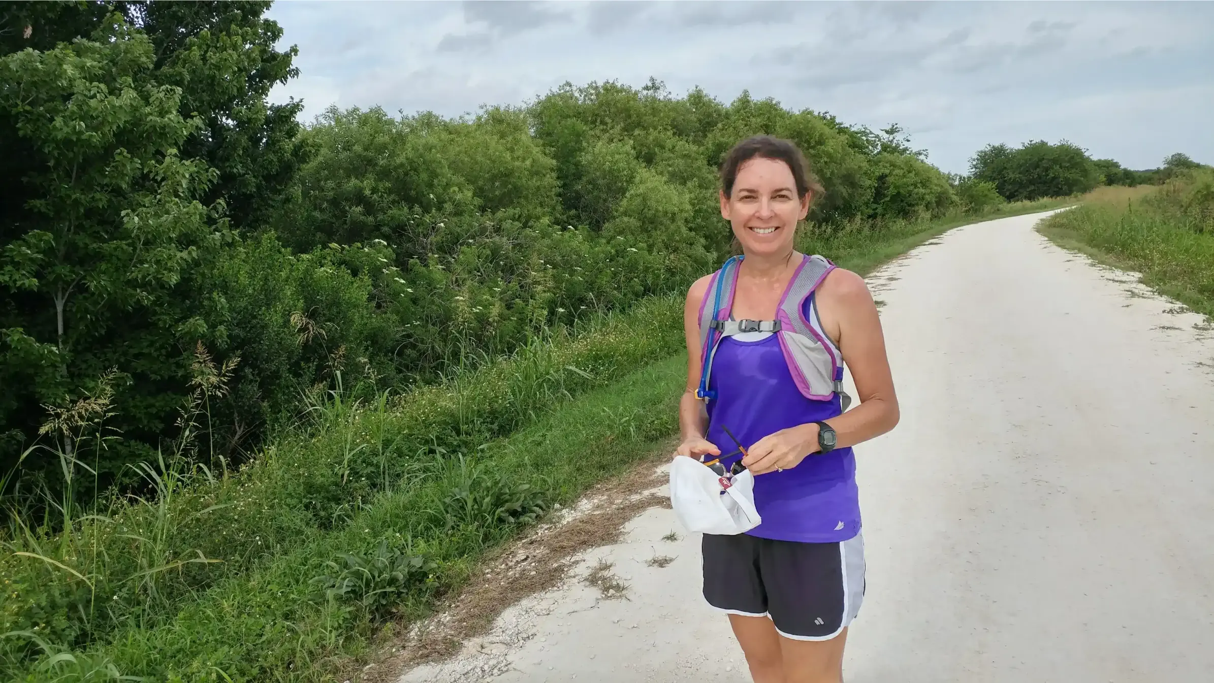 Orlando personal injury lawyer Tina Willis long distance running on Magnolia Trail Apopka Florida with hydration vest.