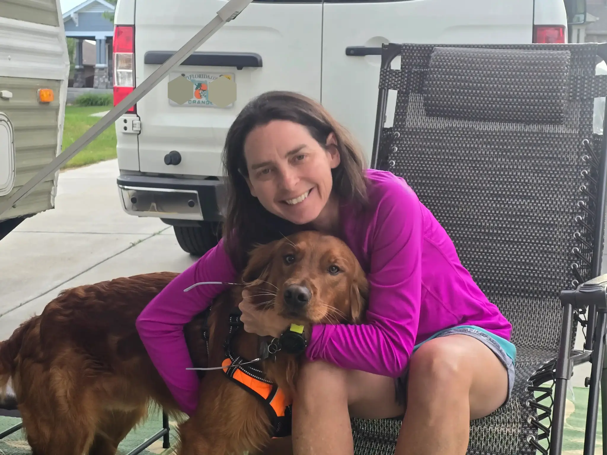 Orlando car accident lawyer Tina Willis with golden retriever dog Central Florida
